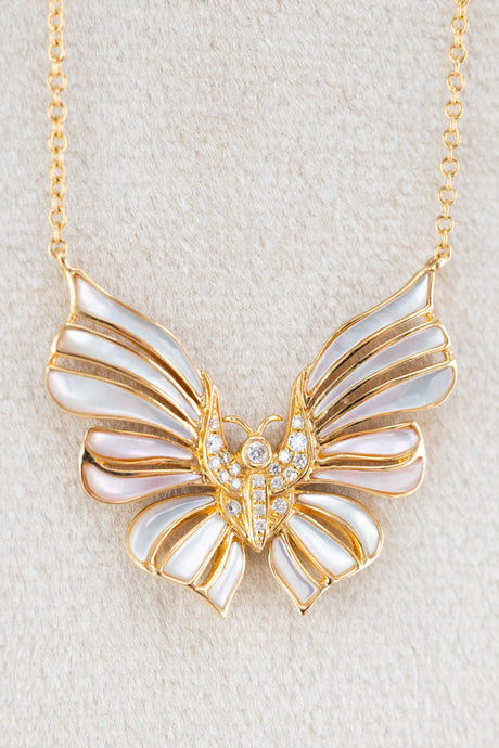 18ct yellow gold mother of pearl butterfly on 18ct yellow gold chain at Delross Design Jewellers