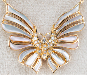 18ct yellow gold mother of pearl butterfly on 18ct yellow gold chain at Delross Design Jewellers