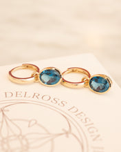 Load image into Gallery viewer, 9ct Yellow Gold London Blue Topaz Huggie Earrings