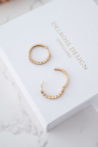 9ct Gold Cubic Zirconia Huggie EarriDelross Design Jeweller, Brisbane Jeweller, Chermside Jeweller, Custom Jewelleryngs, 