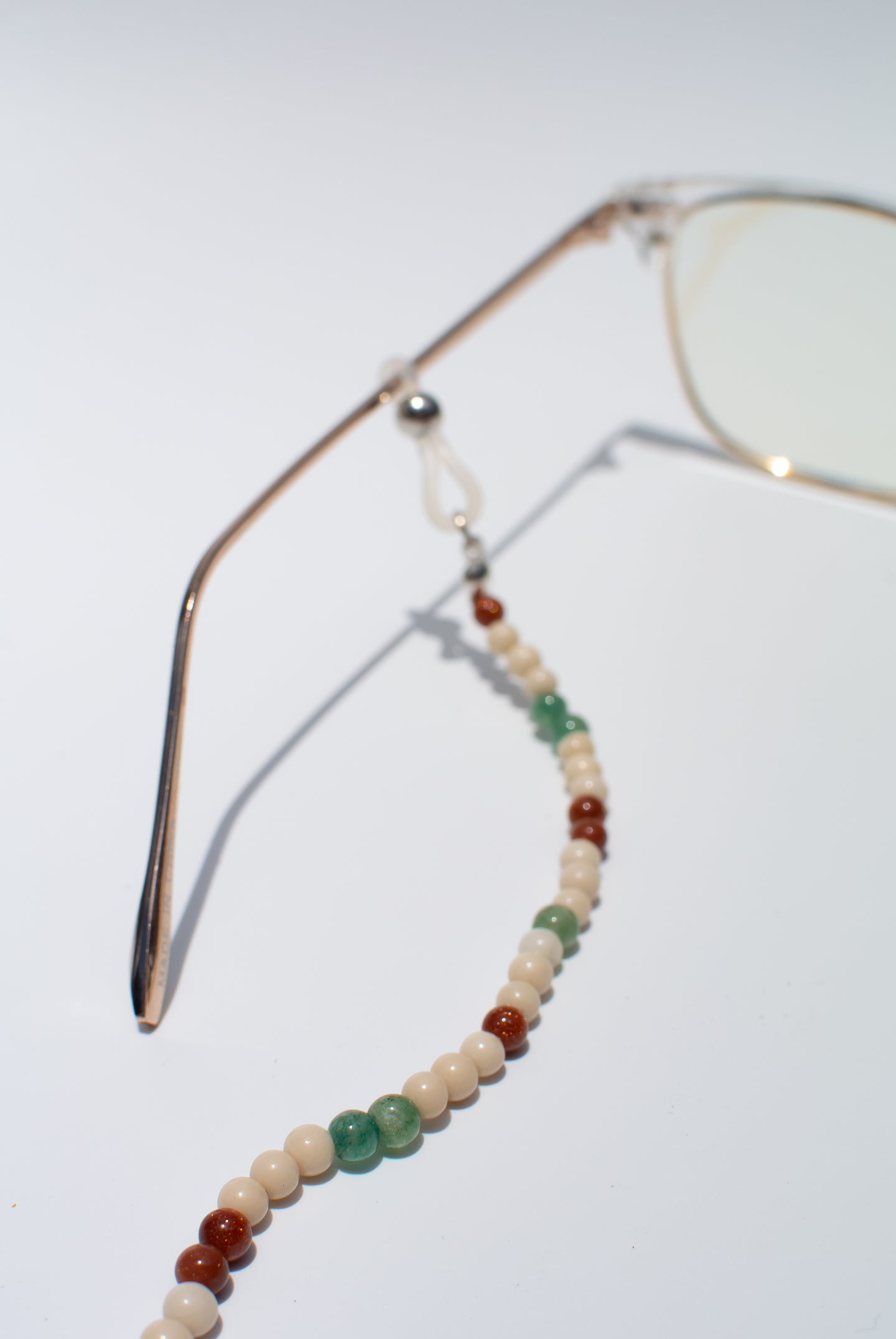 Delross Design Jeweller, Brisbane Jeweller, Chermside Jeweller, Custom Jewellery, Glasses Strand, Cream Fossil Jasper, Goldstone,  Green Jade